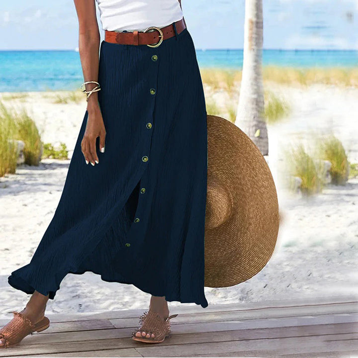 Side view of women's a-line button midi skirt showing casual summer style