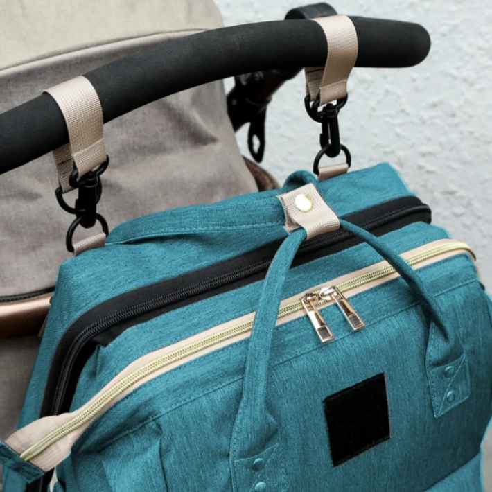 Compact folded view of the baby travel bag ready for airport and road trips