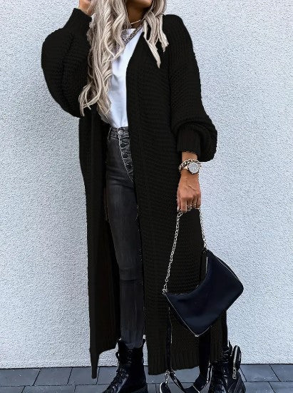 Close-up of soft ribbed texture and knitwear detail on the womens long cardigan