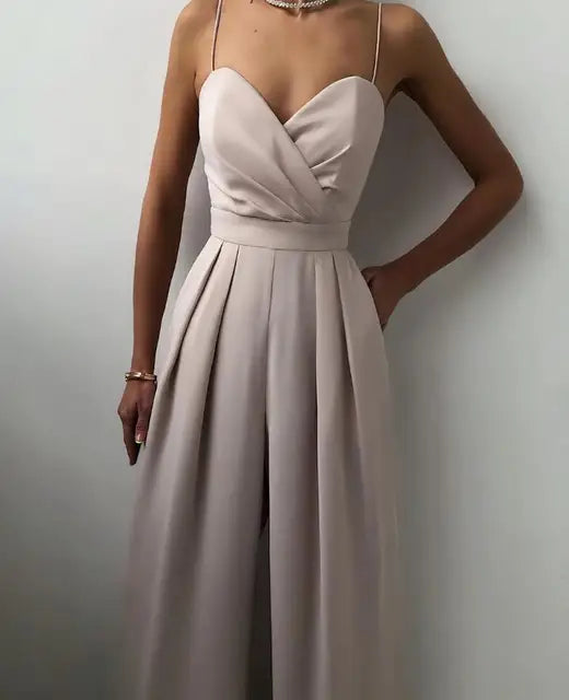 Close-up of premium fabric texture on elegant women's wide leg party jumpsuit