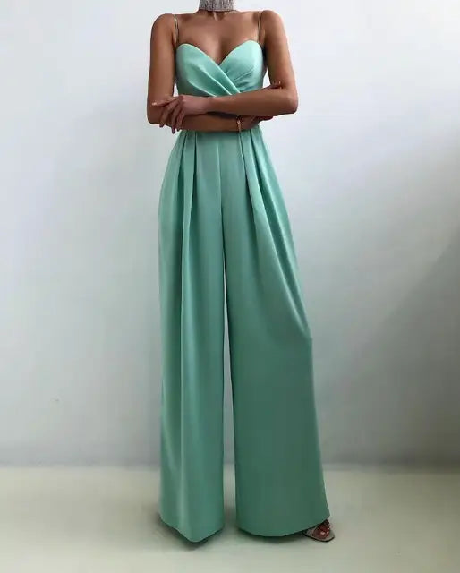 Side profile of women's elegant wide leg jumpsuit showcasing the flowing silhouette