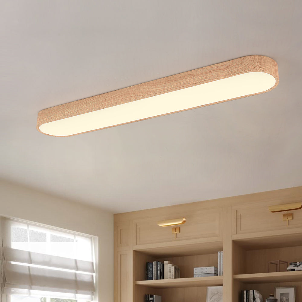 Light brown Nordic oval LED ceiling light mounted on a white ceiling