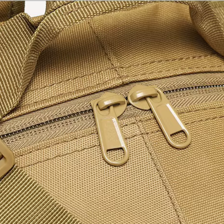 Reinforced stitching detail on shoulder strap attachment point