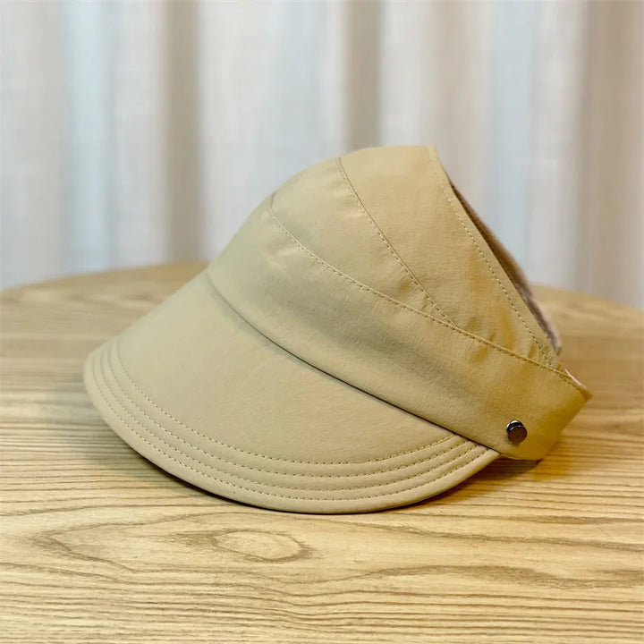 Elegant womens beach hat offering cool shade with open top