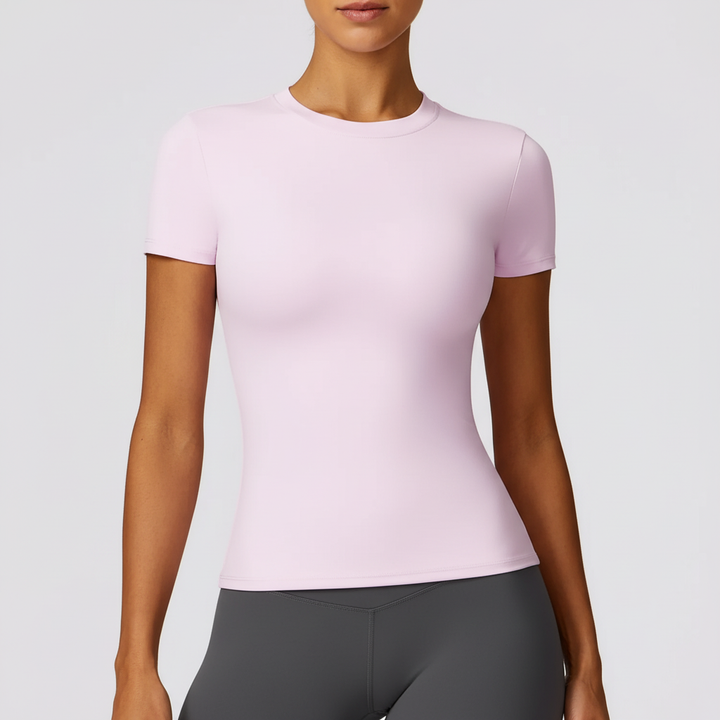 Flat lay of a women's slim-fit short sleeve activewear shirt