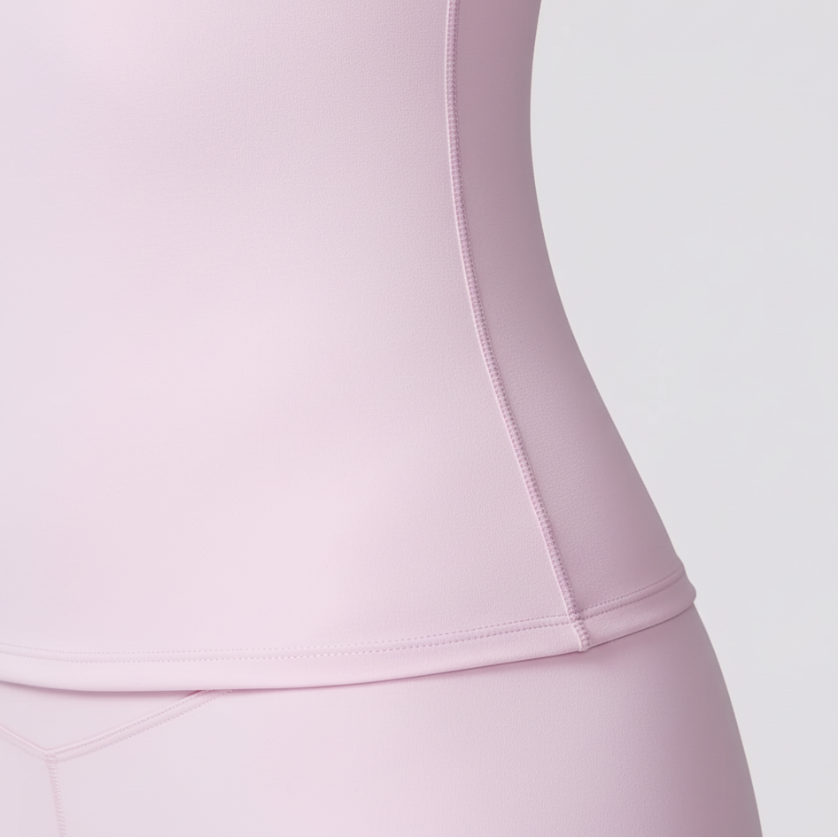 Folded women's athletic top showing soft fitness apparel fabric
