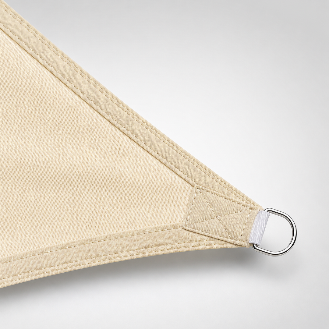 Large triangle sun sail canopy creating a comfortable outdoor shaded retreat