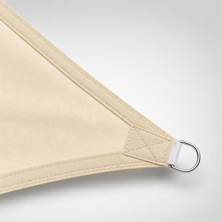 Large triangle sun sail canopy creating a comfortable outdoor shaded retreat