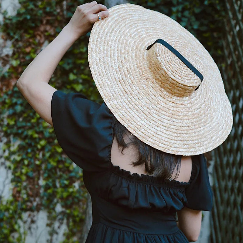 Casual beach hat featuring a wide brim and flat top design