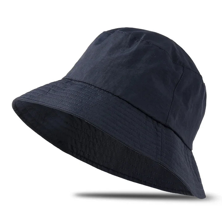 Back view of hiking bucket hat featuring adjustable chin strap for windy days