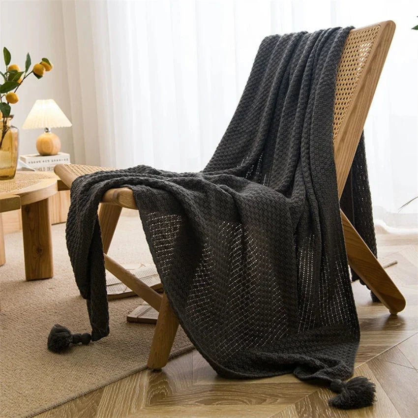 Detailed view of the premium yarn and chunky knit pattern on the blanket