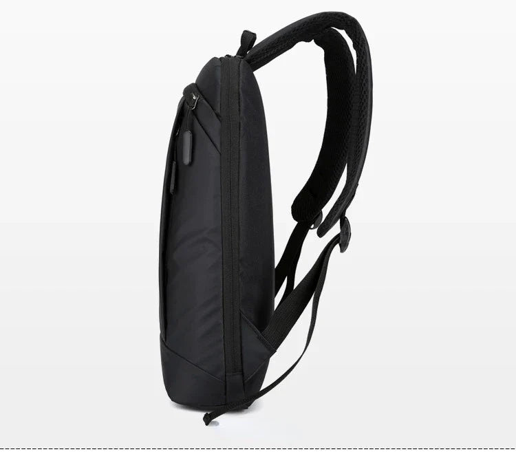 Travel backpack sternum strap and buckle adjustment mechanism