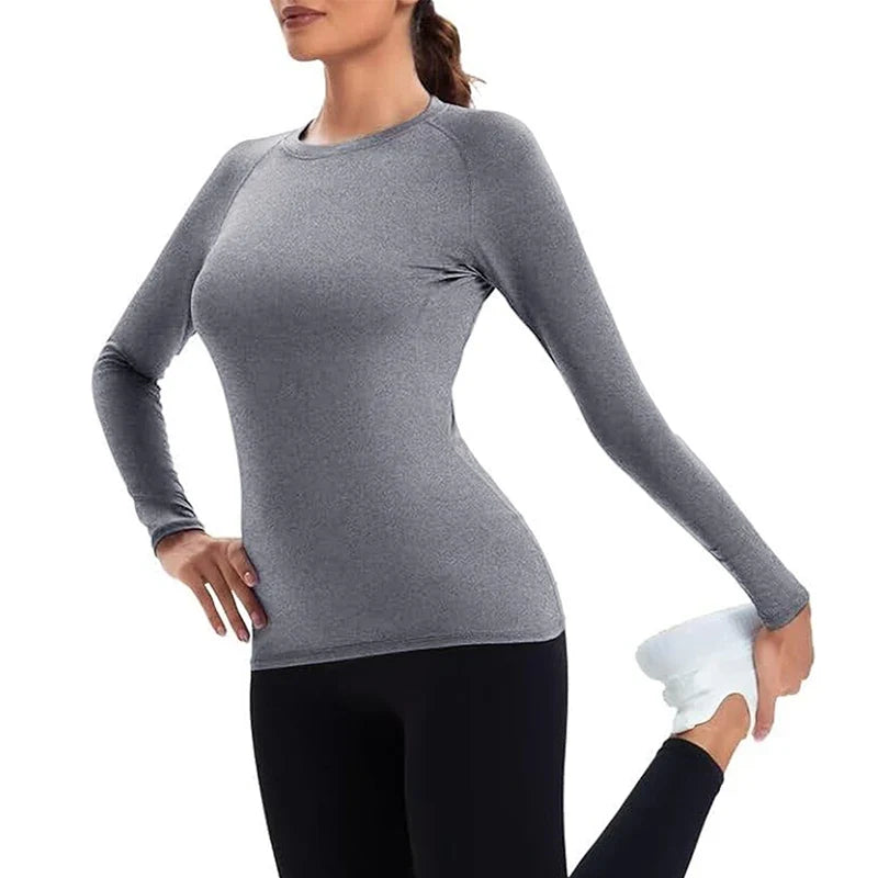 Model wearing womens activewear long sleeve fitness workout top