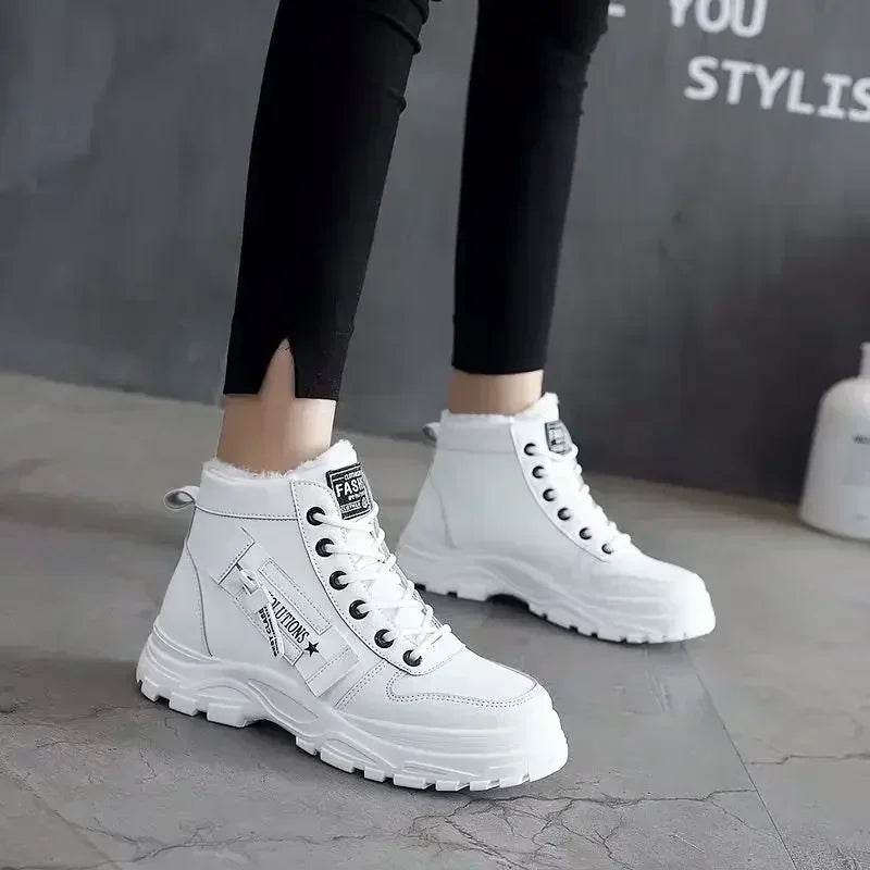 Close-up of high top winter boots detailing upper material and stitching