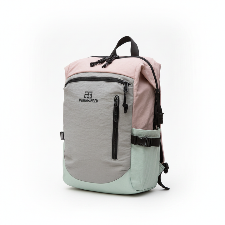 Studio shot of a versatile multi-tone daypack featuring a zippered front pocket