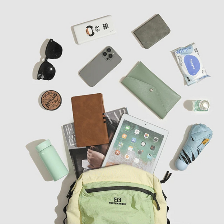 Commuter backpack worn by a model, displaying stylish modern proportions and fit