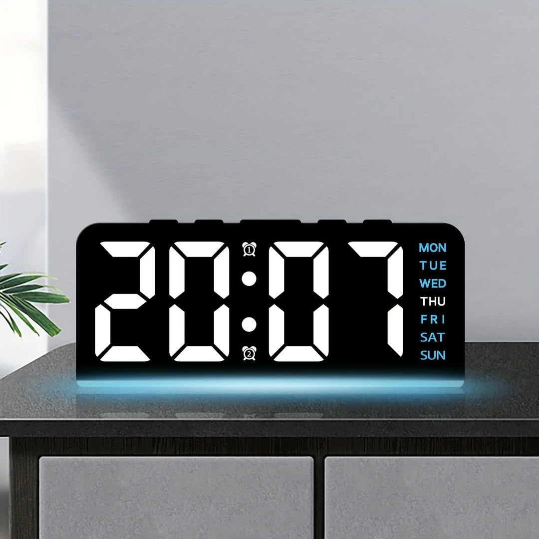 Minimalist digital clock glowing in a dark room to highlight its bright display