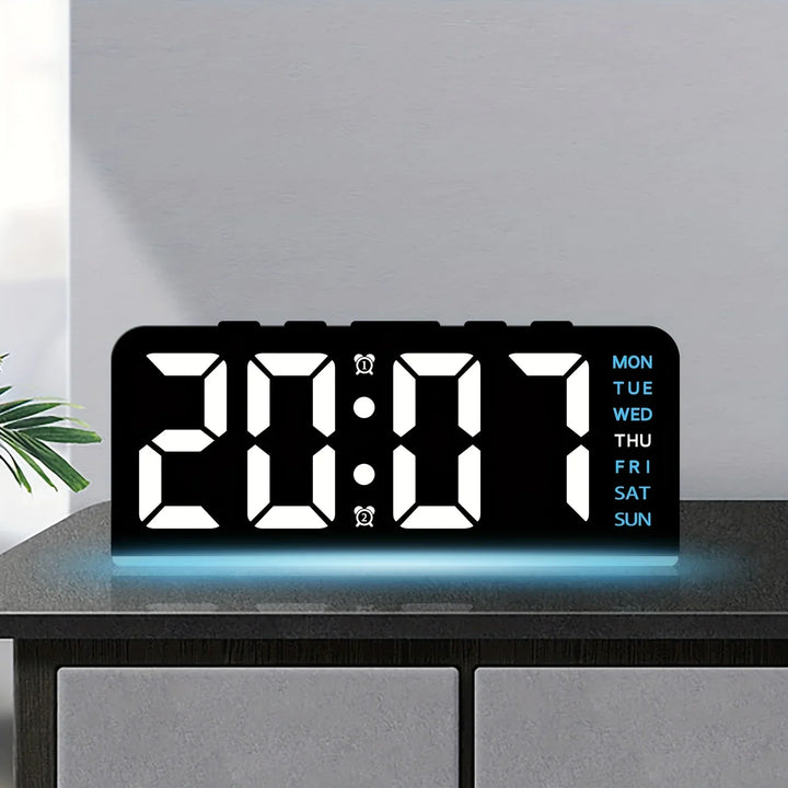 Minimalist digital clock glowing in a dark room to highlight its bright display