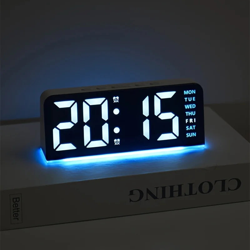 LED digital clock paired with bedroom decor items on a modern nightstand