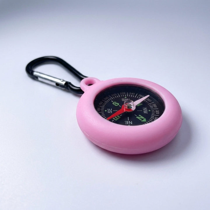 Mini pocket compass featuring clear dial for accurate trail direction and hiking