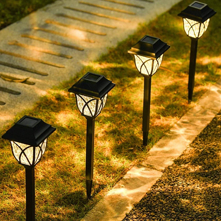 Automatic dusk to dawn solar lights lighting up walkway edges