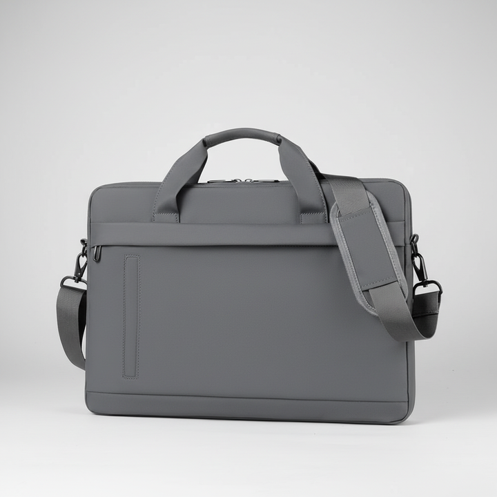 Organized compartments of a professional work bag holding documents and tech.
