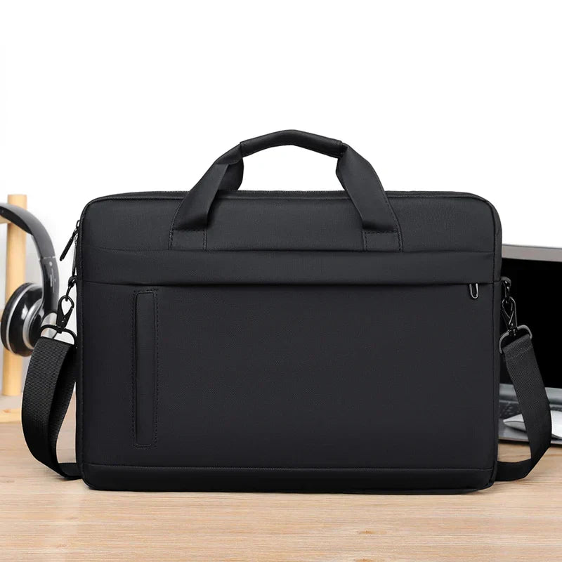 Stylish blue laptop sleeve and commute bag featuring multiple accessory pockets.