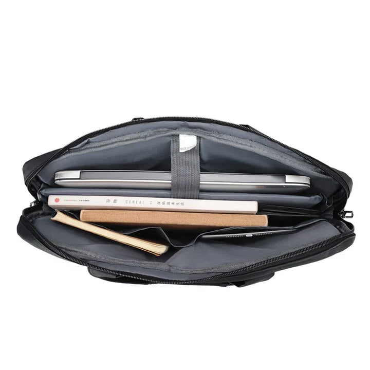 Gray professional work bag and messenger style computer case for daily use.