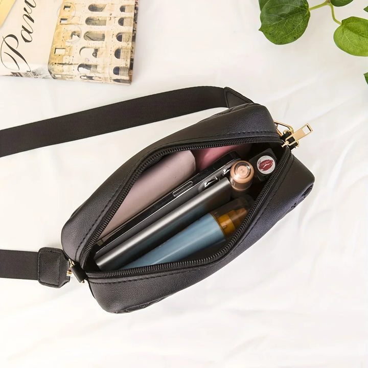 Versatile crossbody bag with strap removed, styled as an elegant evening clutch