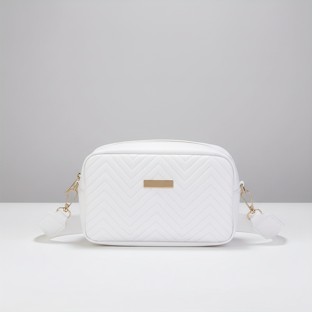 Assorted collection of quilted mini crossbody bags in classic black and white