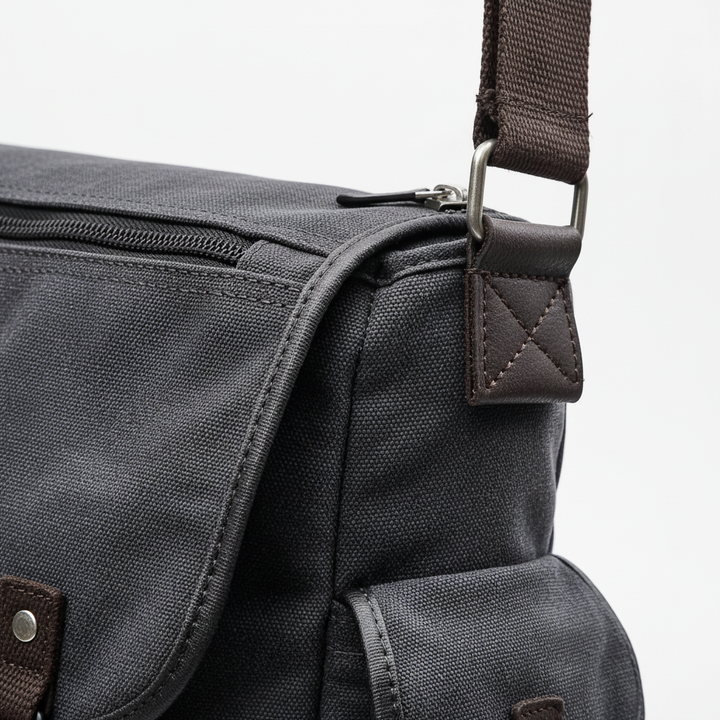 Model wearing the crossbody canvas satchel, highlighting everyday commuter bag style and fit.