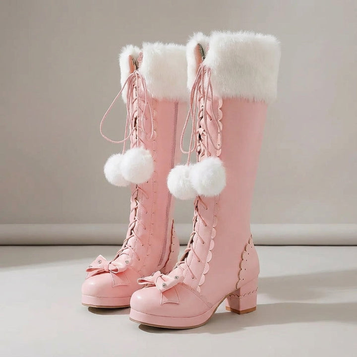 Cute bow detail on black winter platform boots for women