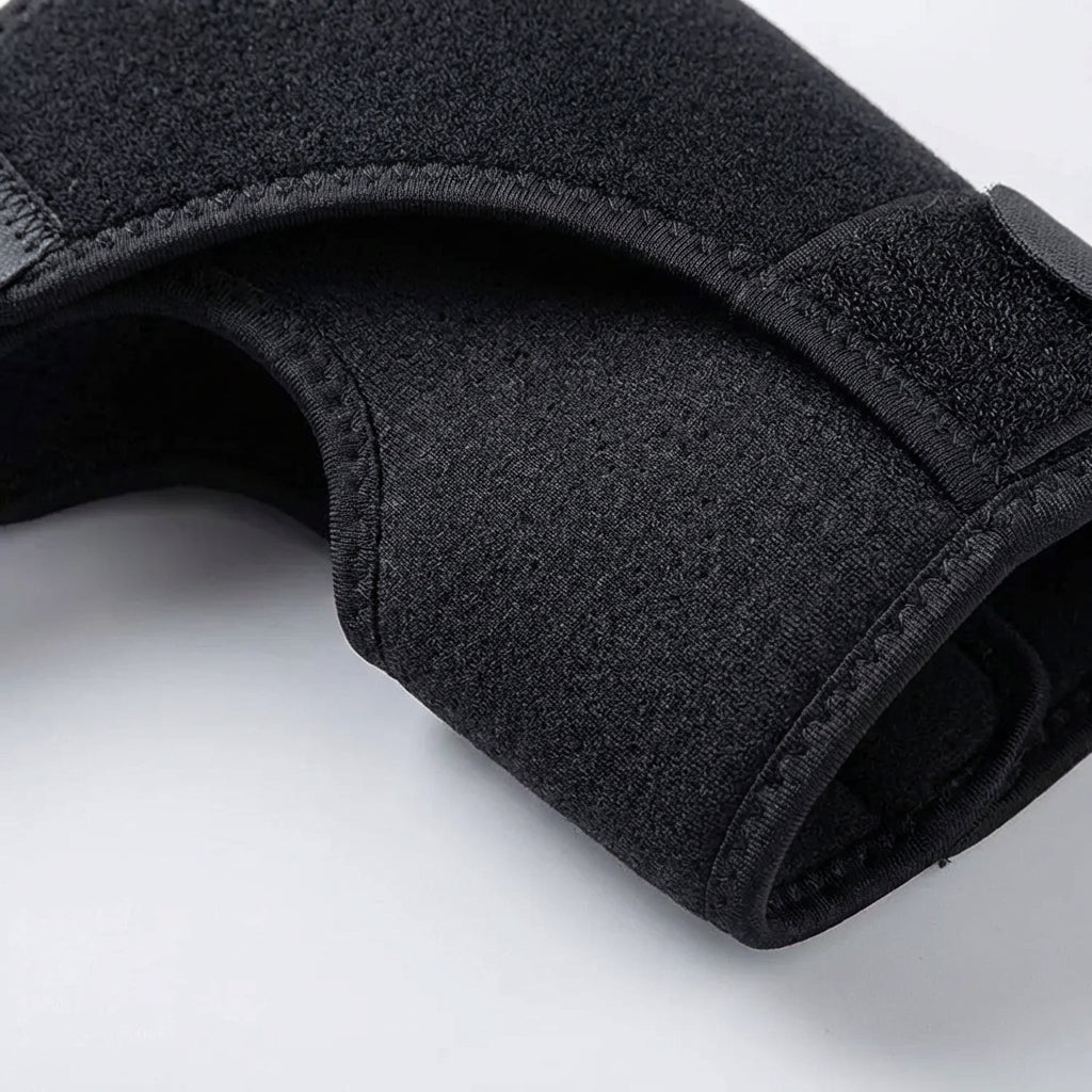 Ergonomic joint stabilization brace fitting snugly over the left shoulder