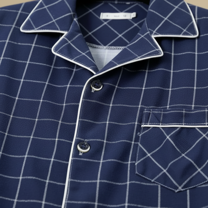 Full view of mens two piece pyjama set folded neatly