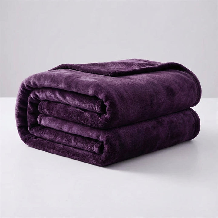 Snugluma lightweight blanket shown in an outdoor lifestyle setting