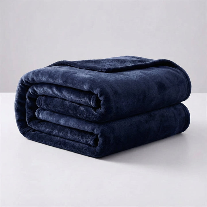 Detailed view of the premium stitching on a Snugluma plush throw