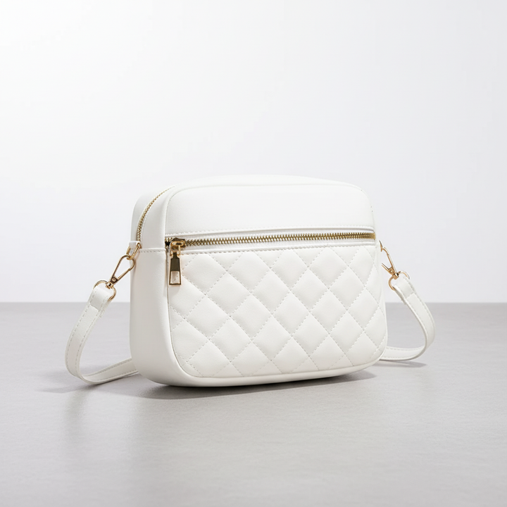 Pink quilted shoulder bag with clasp closure detail