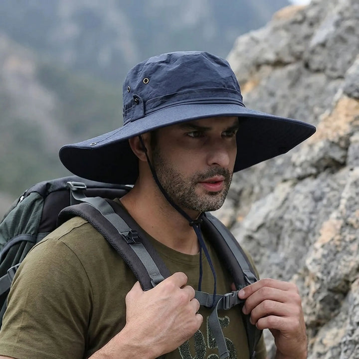 Durable hiking hat featuring an adjustable chin strap for windy days