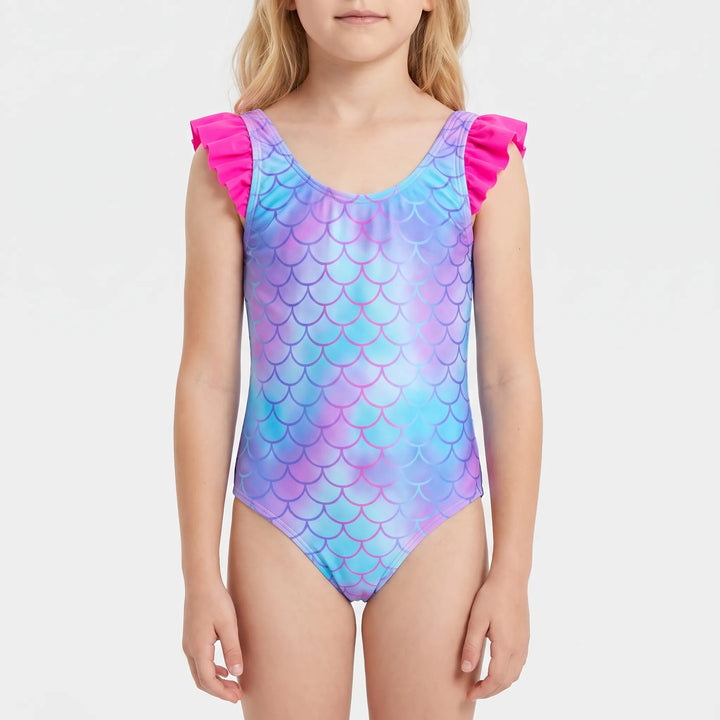 Front view of a child wearing a purple and blue patterned one-piece swimsuit with ruffled straps