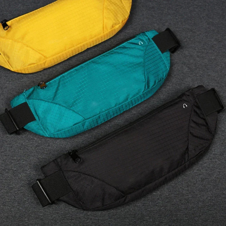Multiple storage pockets open on the versatile travel waist pack