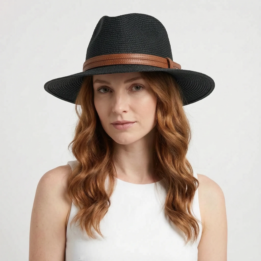 Front view of a black wide brim summer fedora hat with a brown band on a model