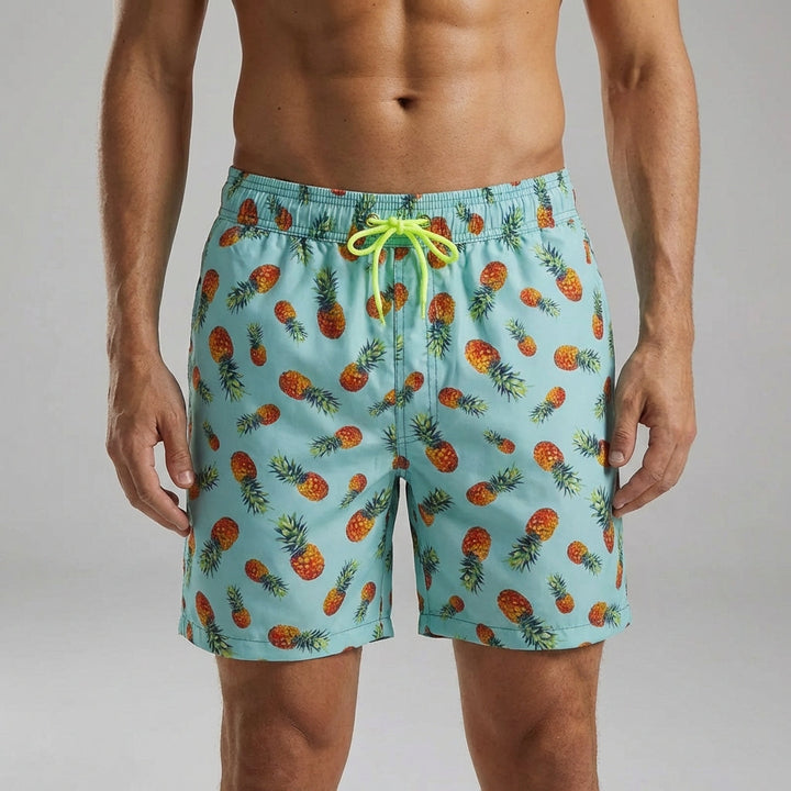 Man wearing light blue pineapple print casual swim shorts