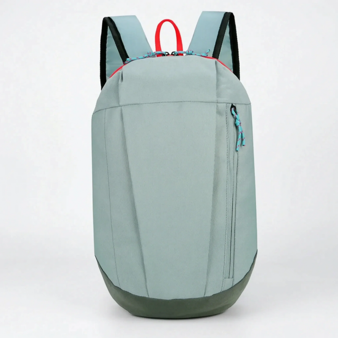 Front view of sky blue mini hiking rucksack with dark green bottom panel on white background