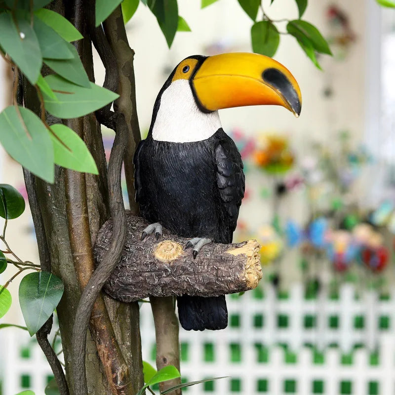 Close-up of vibrant toucan sculpture outdoor garden ornament