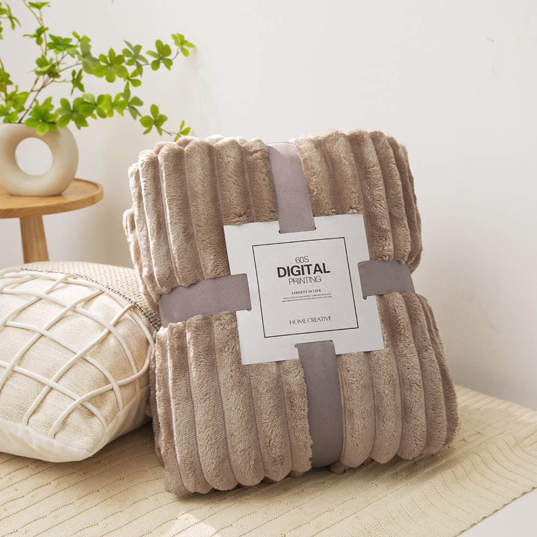 Cozy thick plush throw blanket displayed for living room styling