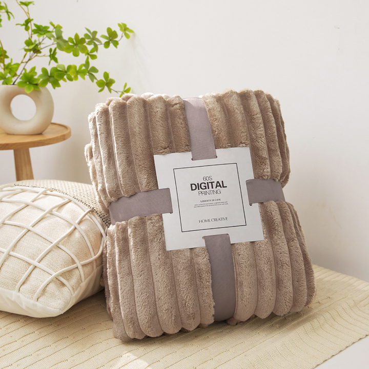 Cozy thick plush throw blanket displayed for living room styling