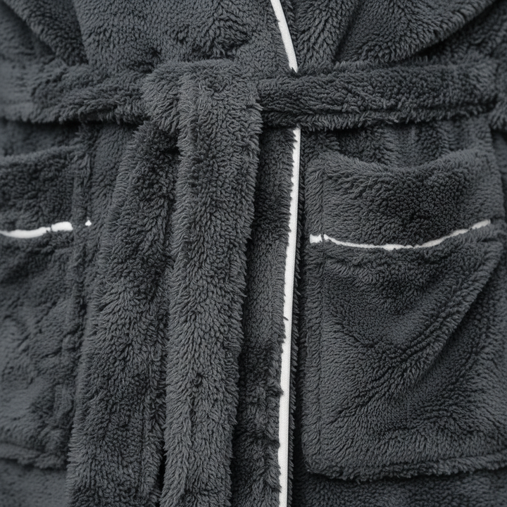 Detailed view of mens bathrobe fabric and hood in luxury loungewear