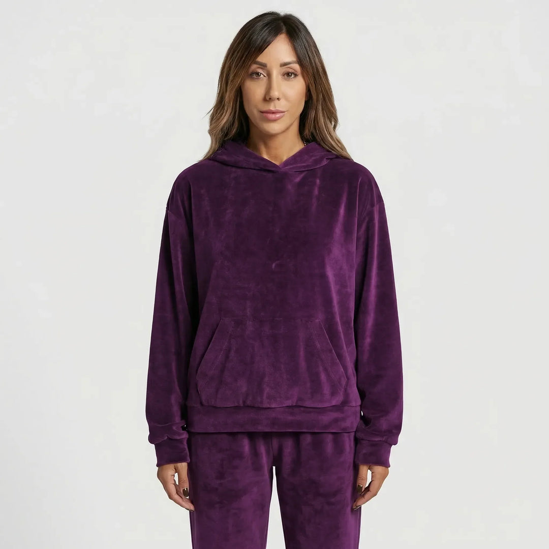 Back view of women's two-piece loungewear set with casual hoodie
