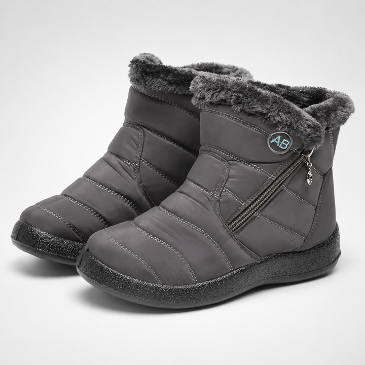 Womens winter fashion ankle boots paired with stylish cold weather wear