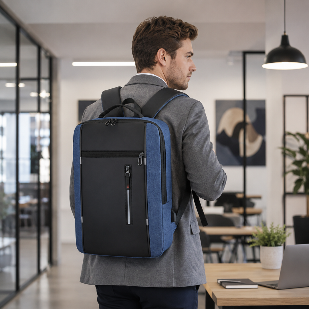 Waterproof usb backpack being tested with water droplets on fabric